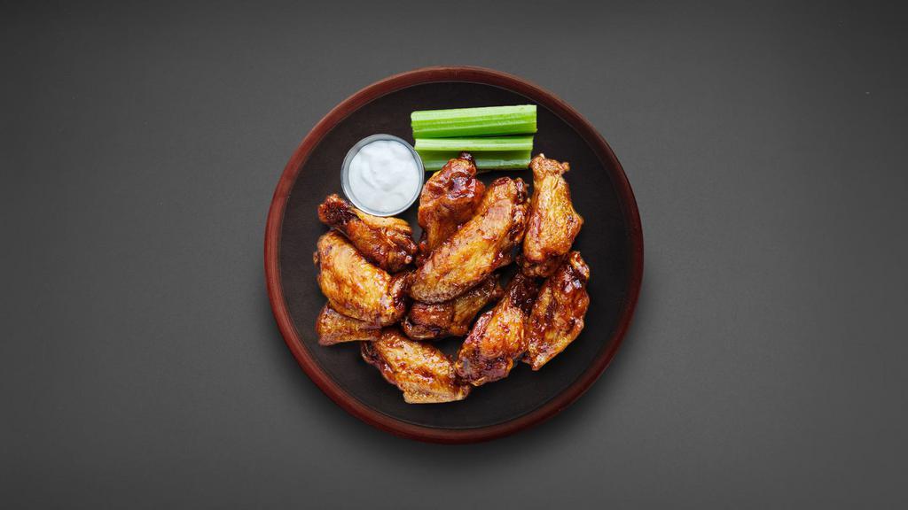 6 Classic Bone-in Wings · 6 classic bone in traditional breaded wings served in your choice of wing flavor with your choice with a dipping sauce.