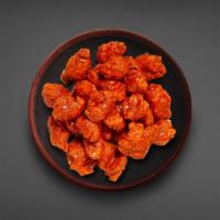 24 Black Bird Boneless Wings · 24 succulent boneless  breaded wings served in your choice of wing flavor with your choice w...