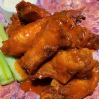 Chicken Wings (8) · spicy buffalo, szechuan, garlic, or housemade BBQ sauce.