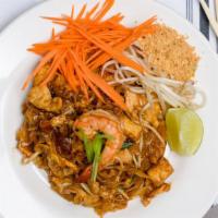 Pad Thai · Stir fried rice, noodle, bean sprout, green onion, ground peanuts.