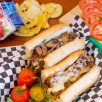 GMO Cheesesteak · Grilled steak, roasted garlic, melted provolone cheese, mushrooms & grilled onions