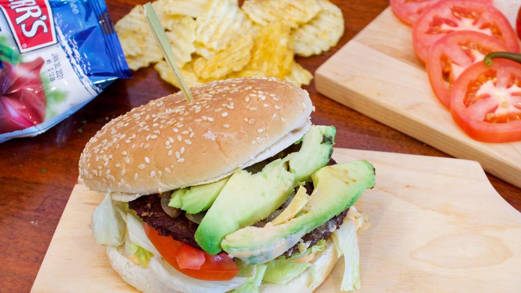 Cali Burger · Beef patty topped with avocado, lettuce, tomatoes, house sauce, pickles & onions