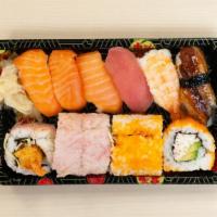 Deluxe Set · Three salmon nigiri, one tuna nigiri, one cooked shrimp nigiri, one unagi nigiri, three Cali...