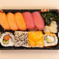 Maga Set · Three salmon nigiri, two tuna nigiri, three California roll, three salmon roll, fueru seaweed.