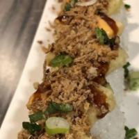 H18. Sashimi Cucumber Roll · Tuna, hamachi, salmon, avocado, wrapped with thin-sliced cucumber with lemon yuzu dipping sa...
