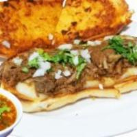 QuesaBirria Torta · Freshly baked telera torta roll, American cheese, birria ,meat, more cheese, and extra chees...