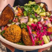 Greens And Eggplant Bowl · Loaded with flavor this bowl has Couscous, Garbanzo, spinach, eggplant hummus, eggplant, kat...