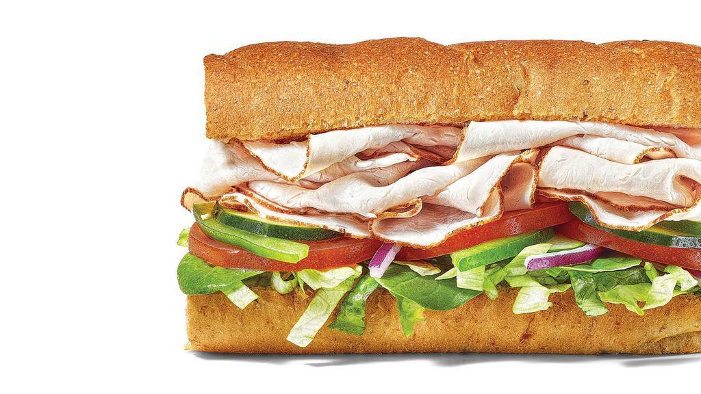 Turkey Breast Footlong · Dive into tender turkey breast piled sky-high with everything from lettuce and tomatoes to banana peppers and onion, if you’re feeling spicy.