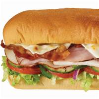 Subway Melt® Footlong · Imagine freshly baked bread stuffed with tender sliced turkey, Black Forest ham, crispy baco...
