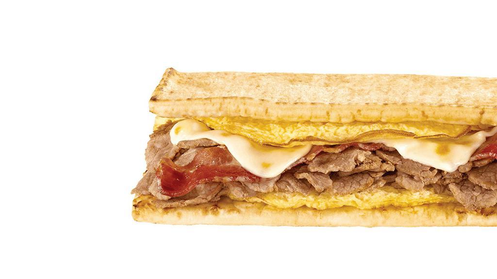 Steak, Egg, & Cheese Footlong · No matter what side of the bed you wake up on, you'll love this. Yummy egg with tender and delicious steak. All covered in melty cheese on flatbread or freshly baked bread. Oh, what a beautiful breakfast.