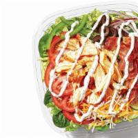 Chicken & Bacon Ranch Chopped Salad · Saddle up and try the chicken and bacon ranch chopped salad. Topped with monterey cheddar ch...