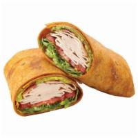 Turkey, Bacon & Guacamole Signature Wrap · The name says it all. A delicious tomato basil wrap filled with a double portion of turkey b...
