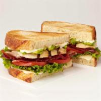 Toasted Chicken Club · All natural chicken breast, applewood smoked bacon, Swiss cheese, smashed avocado, tomatoes,...