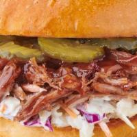 BBQ Pulled Pork Sandwich · Smoked pulled pork, sweet & tangy BBQ sauce, dill pickle slices, house made coleslaw, toaste...