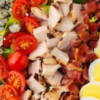 Cobb Salad · All natural diced chicken breast, bleu cheese, applewood smoked bacon, chopped egg, tomatoes...