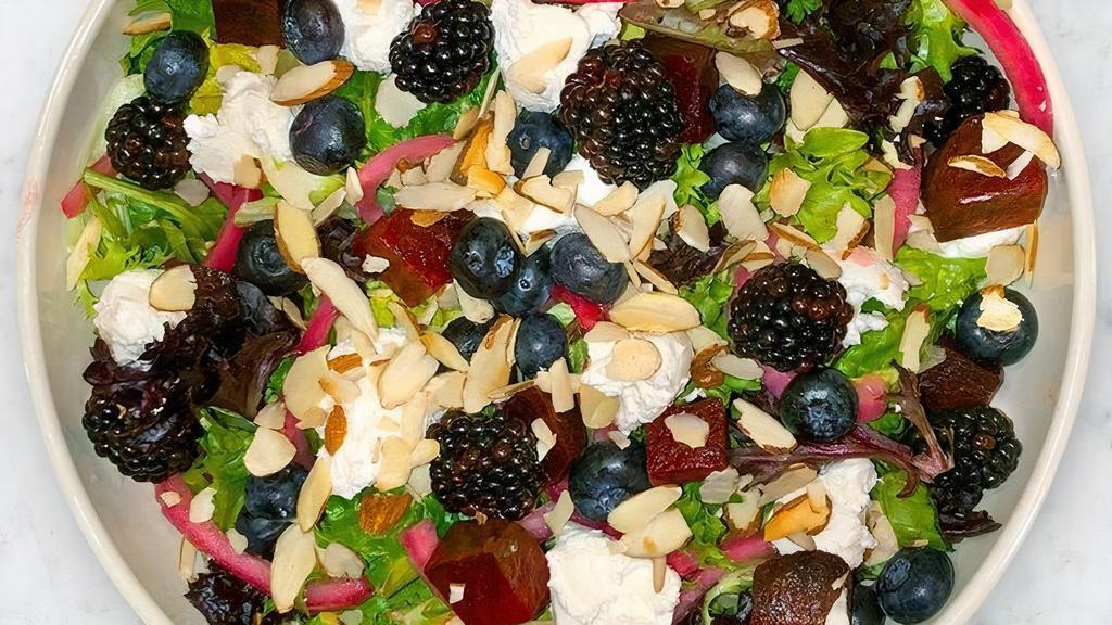 Beets & Berries Salad · Spring mix, roasted beets, fresh blackberries & blueberries, house made pickled red onions, crumbled chevre goat cheese, toasted almonds, balsamic dressing.  Contains Nuts.