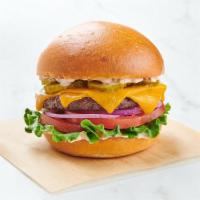 Impossible ™ Burger · IMPOSSIBLE™ burger patty, sharp cheddar, green leaf lettuce, sliced tomato, red onion, dill ...