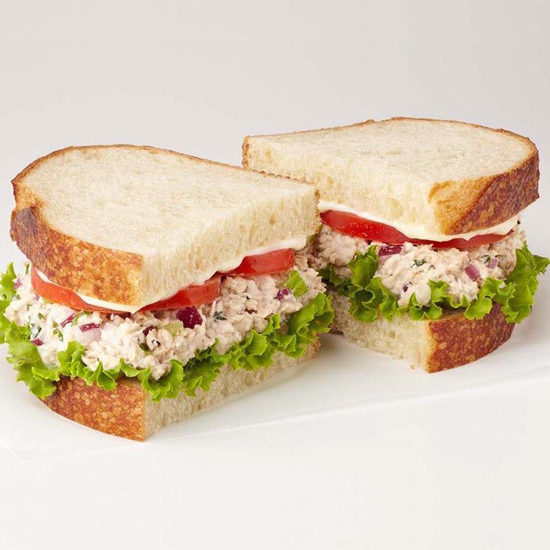 Tuna Salad Sandwich · Tuna, celery, red onion, parsley, tomatoes, lettuce, mayo, sliced sourdough.