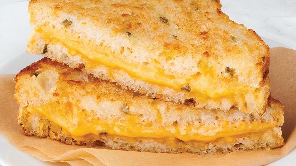  Jalapeno Cheddar Grilled Cheese  · Sharp cheddar melted to perfection on sliced Jalapeno Cheddar bread.