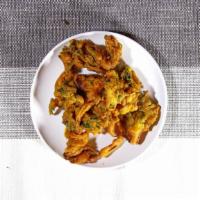 Mix Veggie Pakora · Batter fried cauliflower, eggplant, potatoes, onions, green chili and paneer.