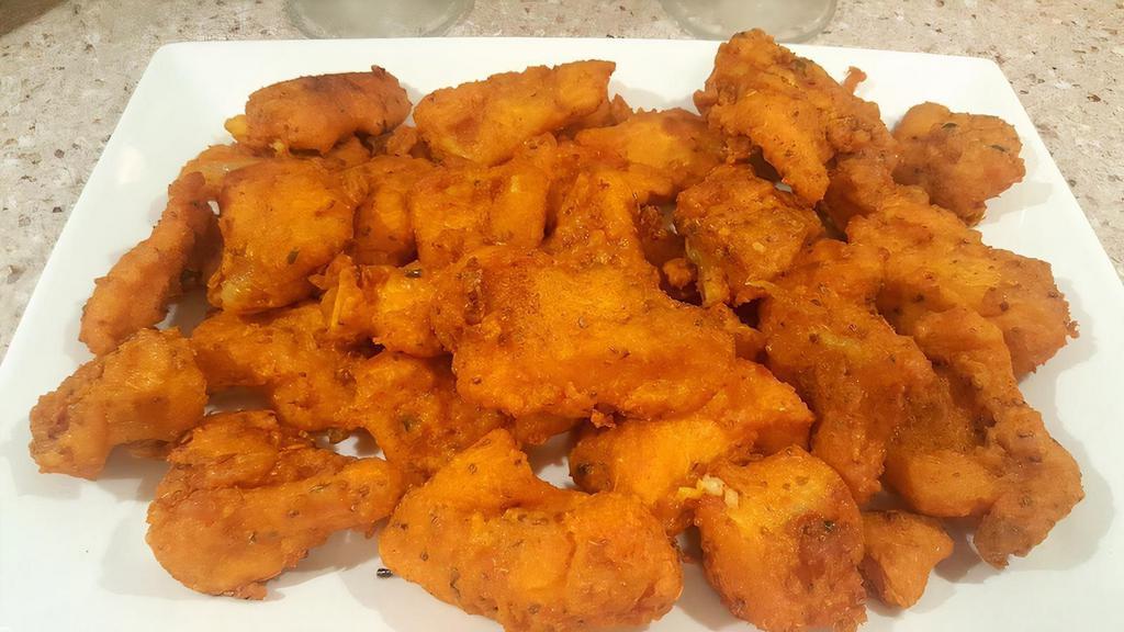 Fish Pakora · Delicately spiced deep fried fish fritters.