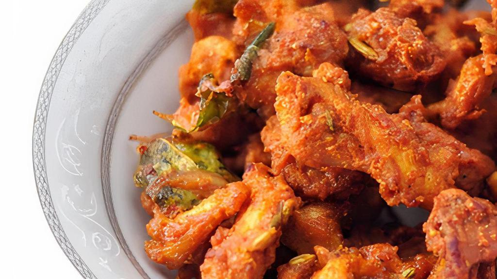 Chicken Pakora · Pieces of chicken dipped in chick pea batter and deep fried.