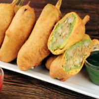 Chili Pakora · Chili dipped in chick pea batter and deep fried.