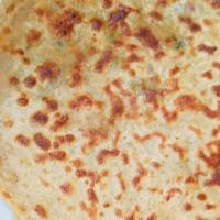 Aloo Paratha · paratha is a whole wheat flatbread that is stuffed with spicy mashed potatoes. It is pan fri...