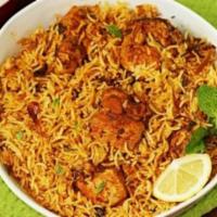 Chicken Biryani · Saffron flavored basmati rice with chicken and nuts