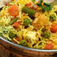 Vegetable Biryani · Saffron flavored basmati rice with vegetables and nuts