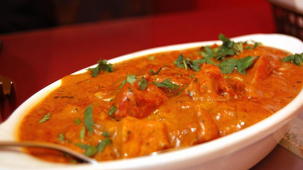 Butter Chicken · Shredded roasted chicken in tomato and butter cooked with creamy sauce