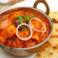 Prawn Tikka Masala · Fresh Prawn in tomato and butter cooked with creamy sauce