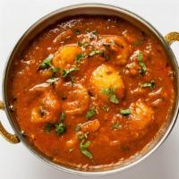 Prawn Vindaloo · Prawns cooked with spicy sauce and potatoes