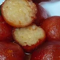 Gulab Jamun · Gulab jamun fried balls of a dough made from milk solids and semolina, soaked with an aromat...