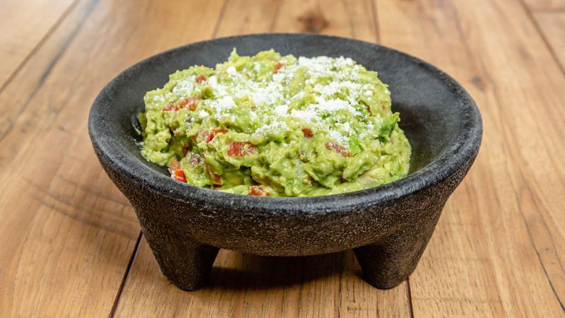 Fresh Guacamole · Fresh Hass avocados, diced jalapeños, pico de gallo, topped with fresh lime juice and cotija cheese. We mash thousands daily.
