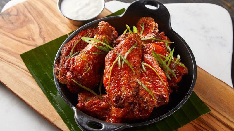 BORDER WINGS · Gigante chicken wings tossed in your choice of Mexican BBQ or spicy wing sauce served with ranch dipping sauce.