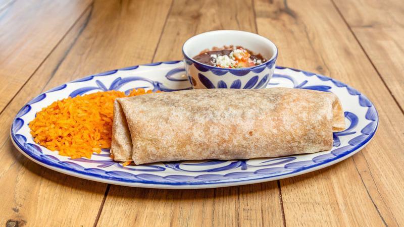 Fajita Burrito · choice of meat, fajita veggies, fresh mex® rice, beans a la charra, cheese, and our famous fire-roasted salsa stuffed into a warm flour tortilla.