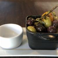 Warm Provencal Olives · Marinated with rosemary and citrus