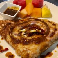 Veggie Spicy Crepe · Sun-dried tomatoes, pineapples, mushroom, and mozzarella cheese with house special made spic...