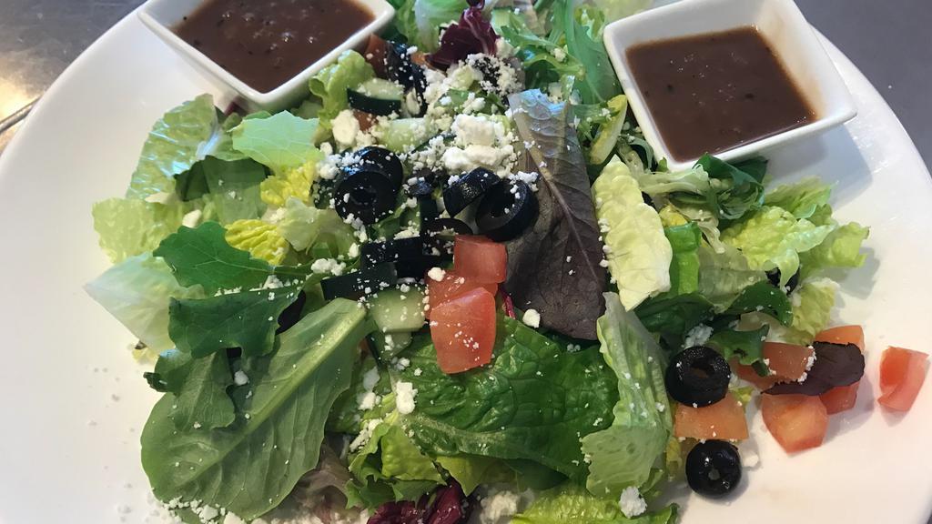 House Salad · Mixed greens, tomato, cucumber, feta cheese with balsamic dressing.