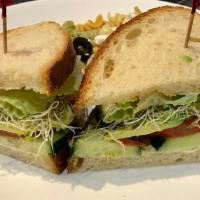 Veggie Sandwich · Avocado, cucumber, tomato, lettuce, sprouts, onion, mustard and mayonnaise.