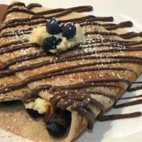 I-Berry Blueberries Crepe · Cheesecake and fresh blueberries with nutella chocolate and mocha sauce.