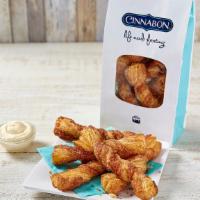 Cinnabon Stix® · Crispy sticks baked fresh with sugar and Makara® cinnamon, served ready to dip. Comes with a...