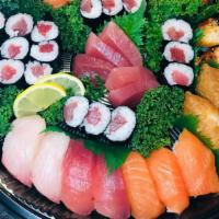 Sushi Tray #3 (  serve 2-4 pp) · Free Bottle Sake or 2 Japanese Beers
-12 pc nigiri:  Tuna & Salmon & Hamachi 
-2pc Unagi & 2...