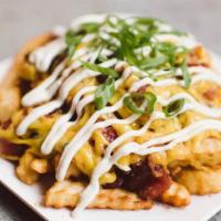 Chili Chz Style Fries · Organic Crinkle Cut Fries Smothered in House-Made Chili and Melted Cheddar Cheese. Topped wi...
