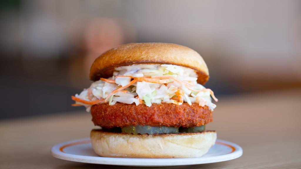 Buffalo Cluckwich · Buffalo RED CluckPatty, Creamy CluckSlaw, Organic Pickles & Garlicky Ranch.  Allergies: Chik'n Patty Contains Gluten & Soy. White Bun Contains Gluten. Ranch Dressing Contains Soy.