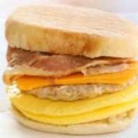 #1 English Muffin · Bacon, Egg, Cheese, and choice of Ham or Sausage.