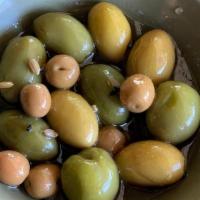Marinated olives · citrus zest, fennel seed, garlic, nigella