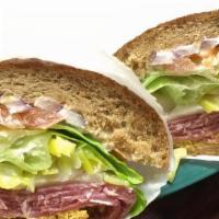 Salami Ultimate Sandwich · With avocado, Swiss cheese, mayonnaise, mustard, lettuce, tomatoes, onions and pickles.