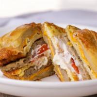 Breakfast Melt Sandwich · Choice of bread and meat, with cheese, eggs, tomatoes and mayo.